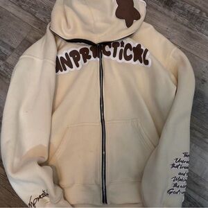 Cream unpractical zip up